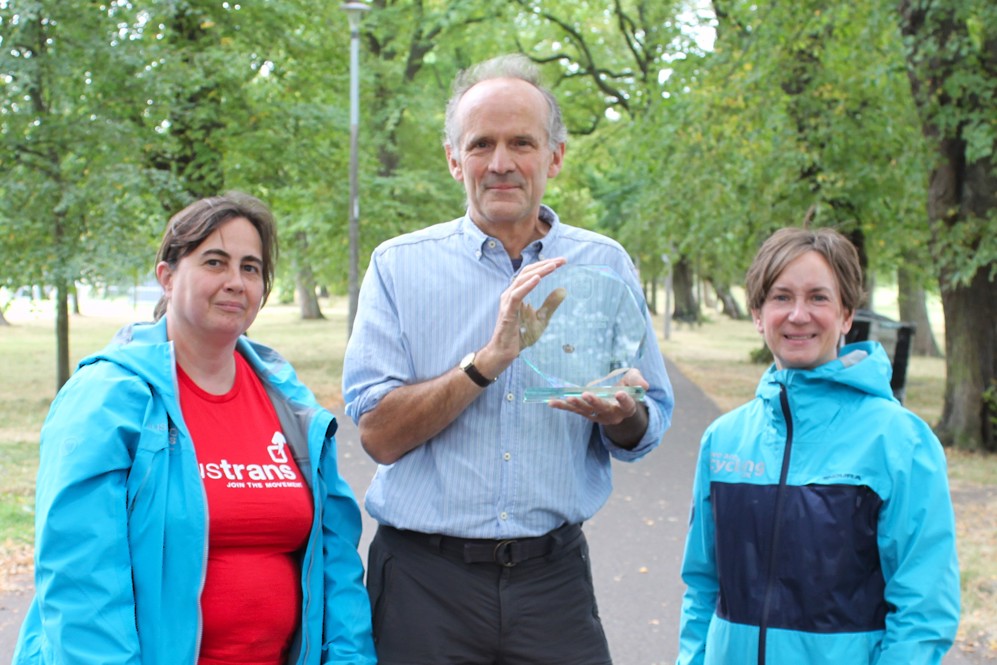 Phil Noble, 2025 Cycling Champion of the Year (centre), pictured with Cecilia Oram (Sustrans, left) and Suzanne Forup (Cycling UK, right)