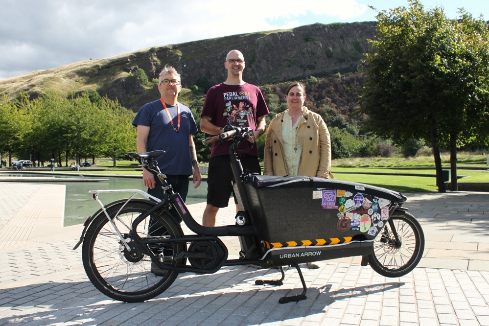 Cycling Champion of the Year 2026, Ben Seven, pictured in front of the Scottish Parliament