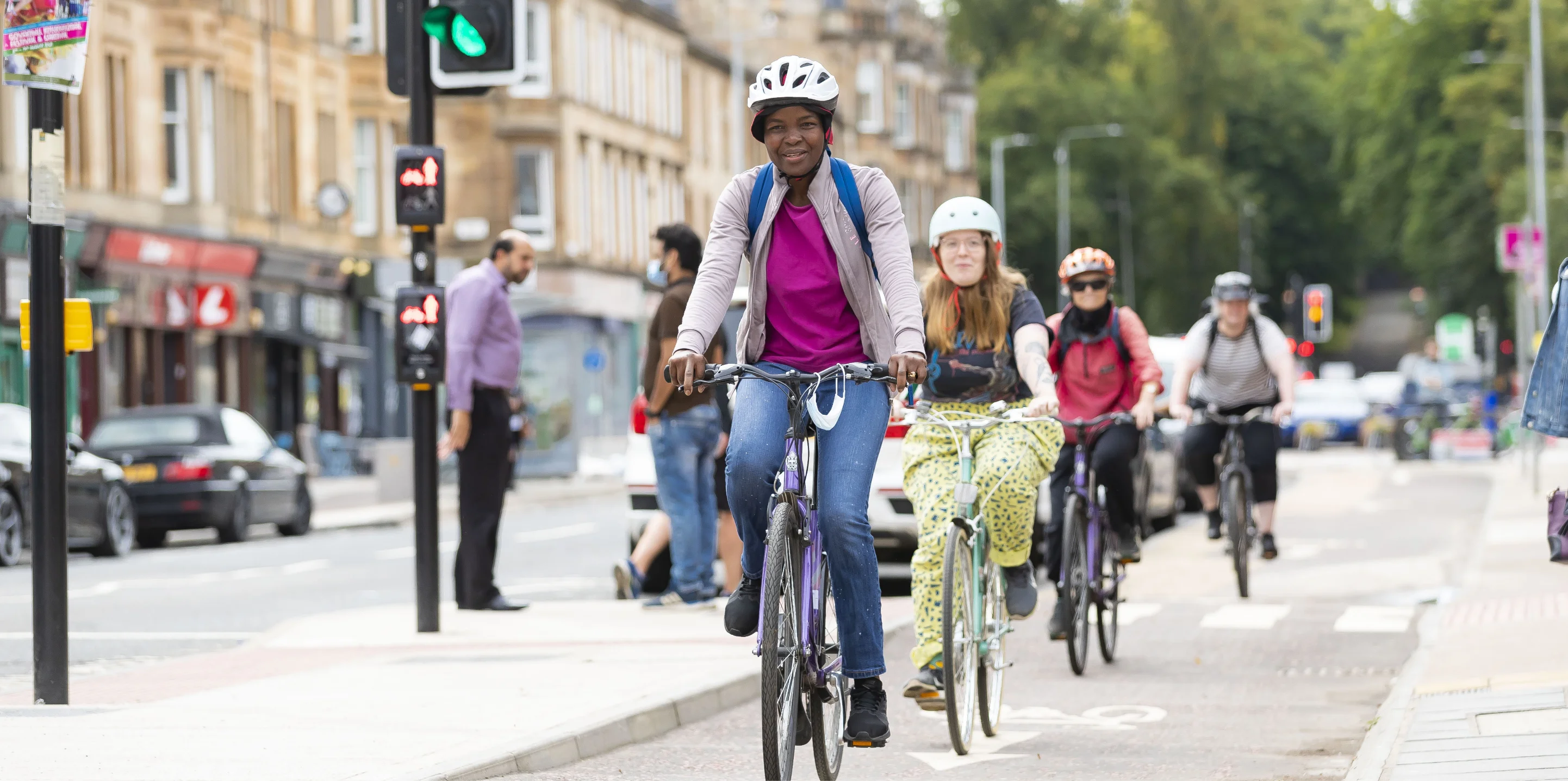 People riding on an urban cycle path