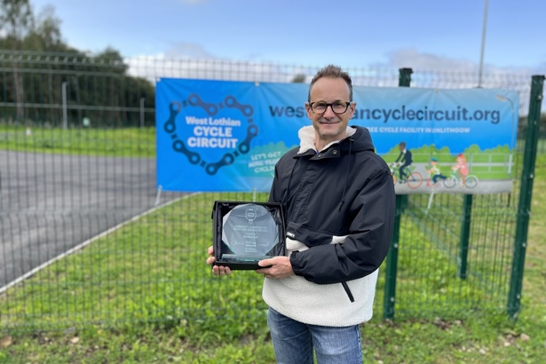 Matthew with award at West Lothian Cycle Circuit