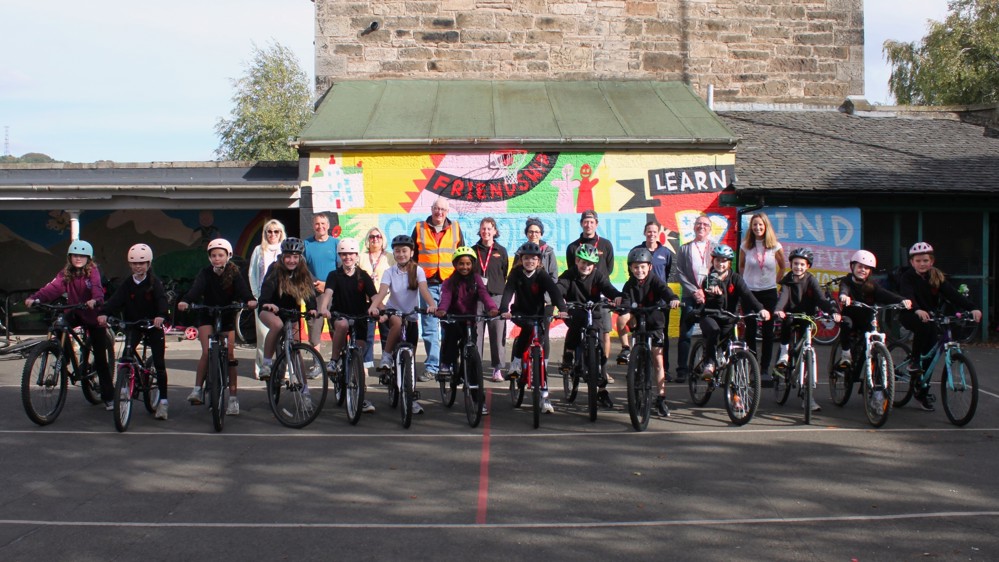 Pupils and staff at Corstorphine Primary in Edinburgh with their Bikeability Scotland School of the Year 2026 award trophy
